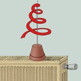 Бумажная змейка, помещённая на тёплый радиатор